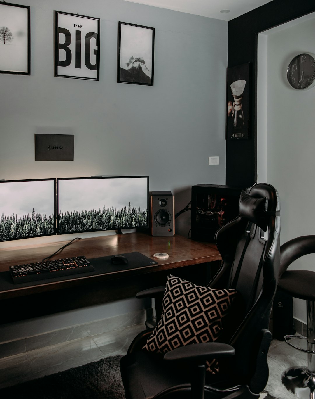 black flat screen tv on brown wooden table