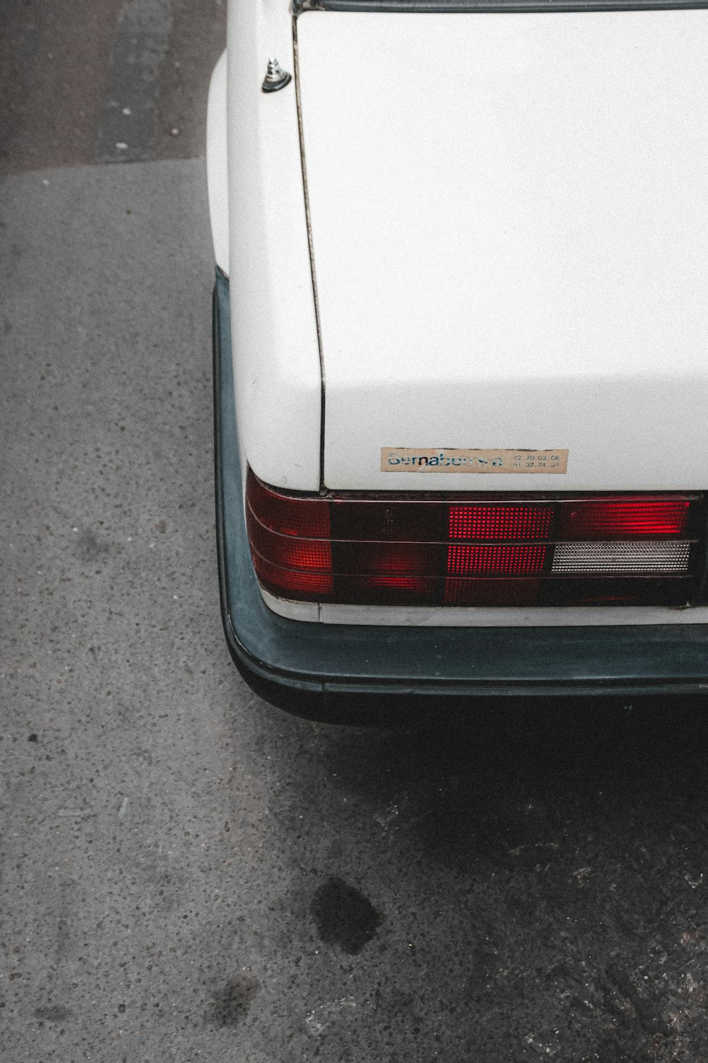 white chevrolet car on road