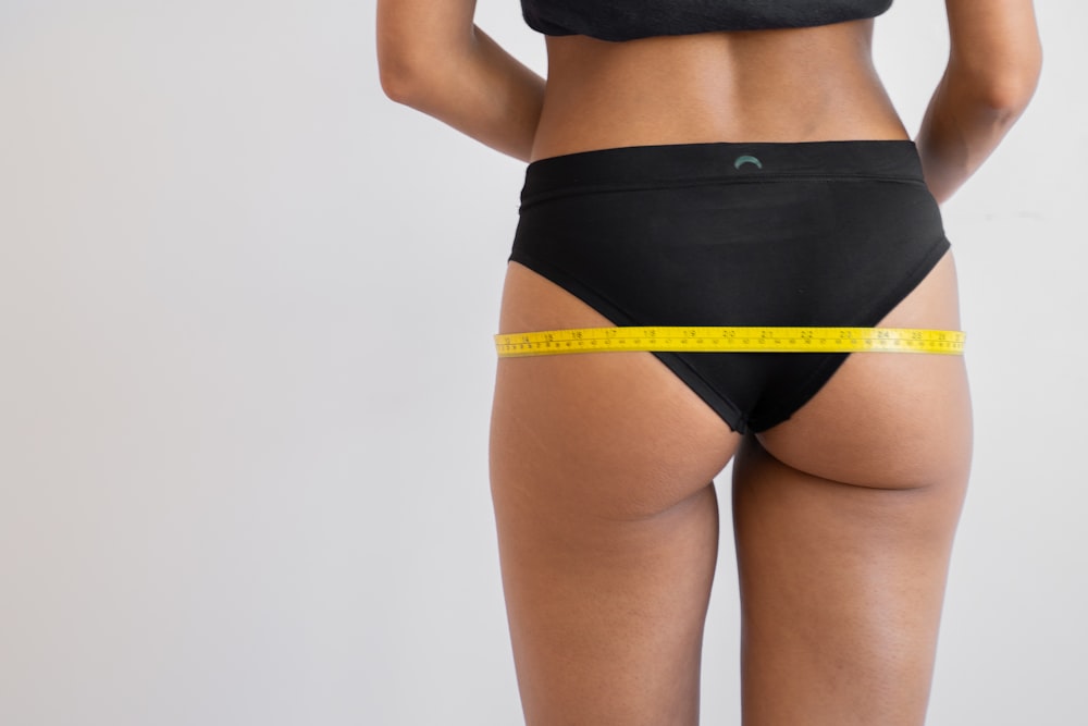 Woman in black sports bra and black panty photo – Free Underwear Image on  Unsplash
