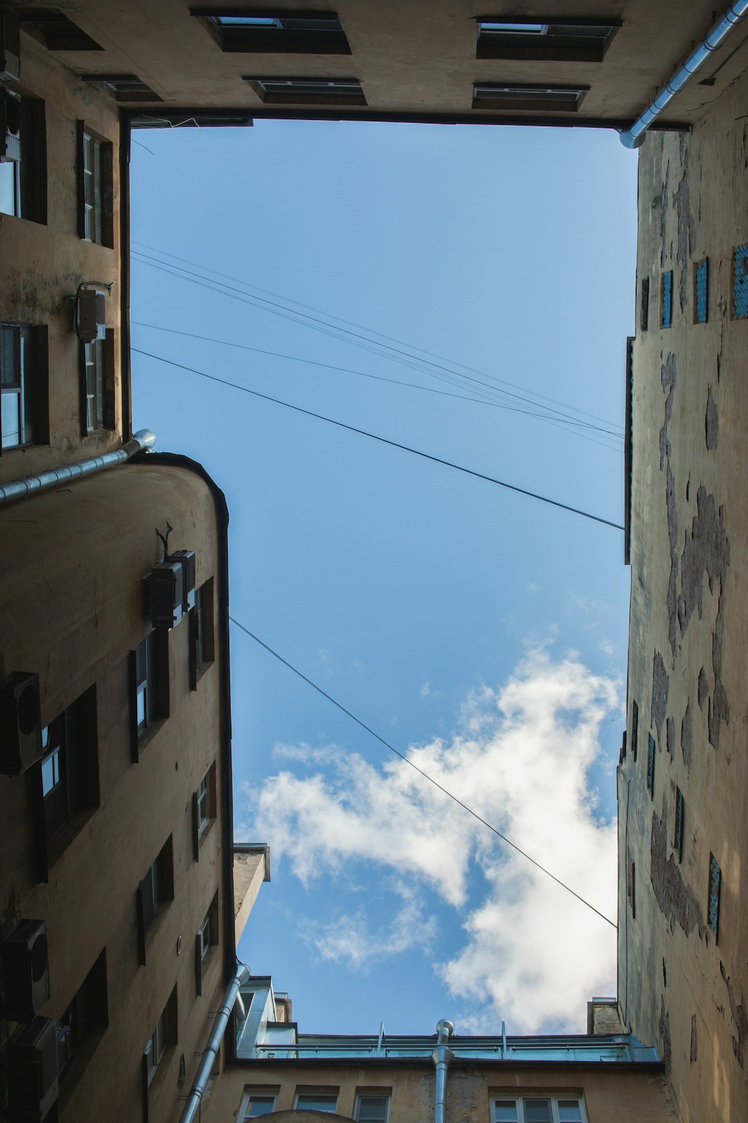 brown concrete building under blue sky during daytime