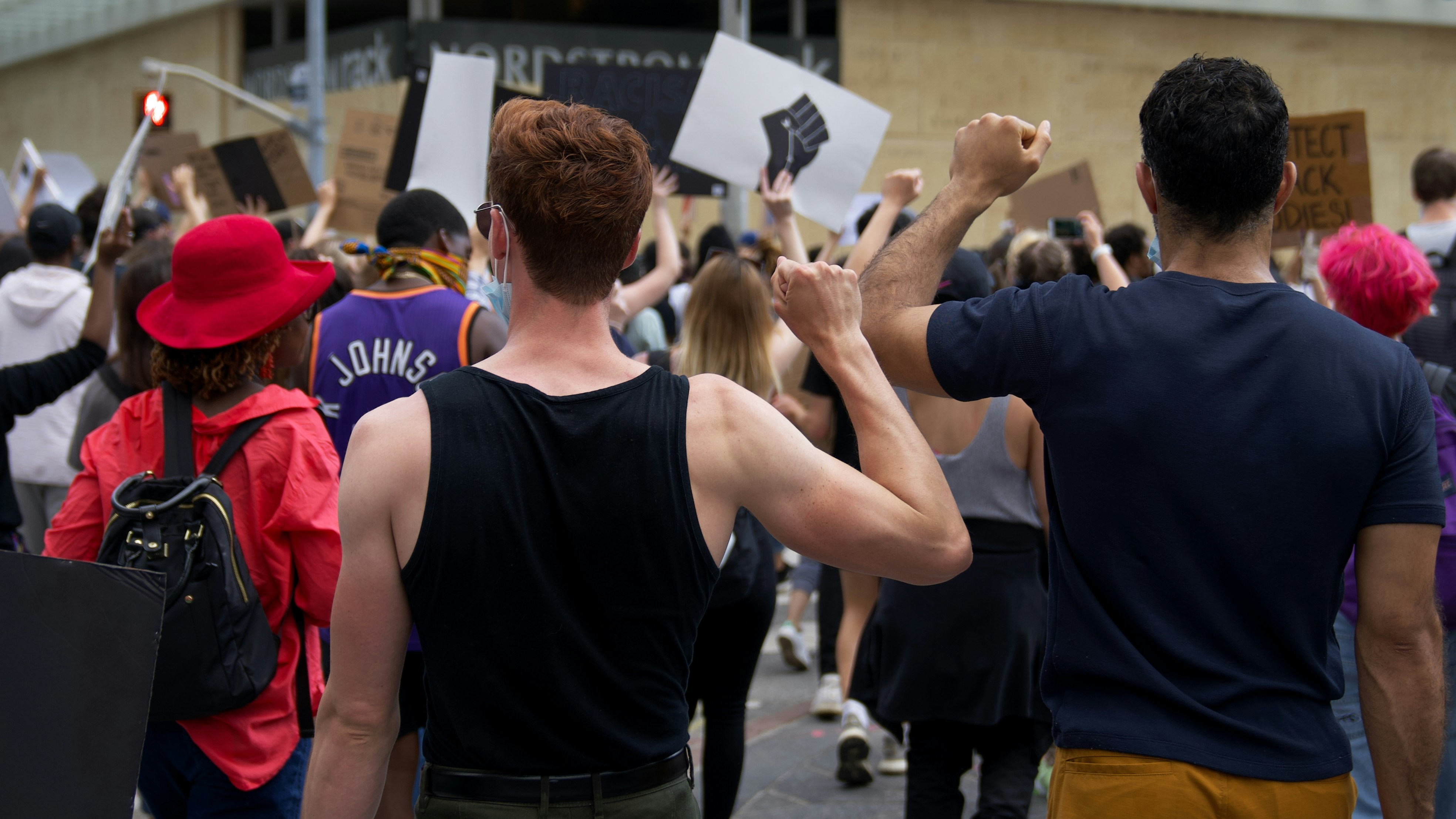 Two groups of people, one appearing satisfied and the other disgruntled, symbolizing the divided opinions on the new rule.