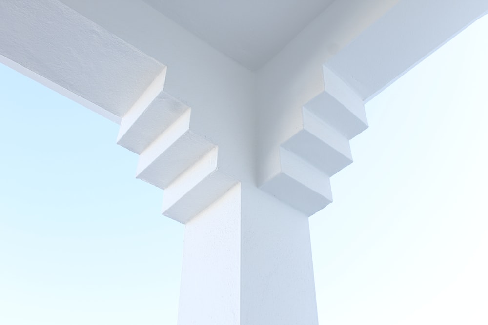 white concrete cross with white background