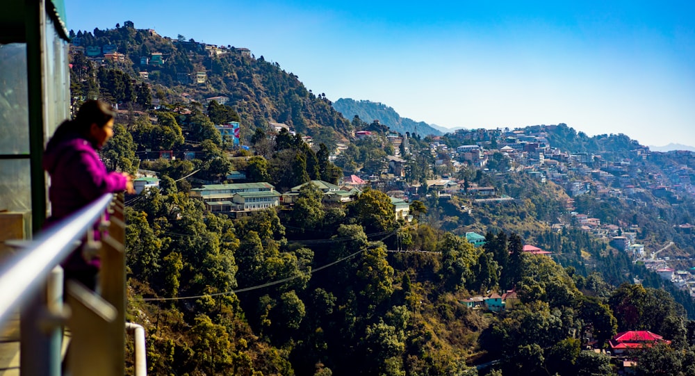 green trees on mountain under blue sky during daytime