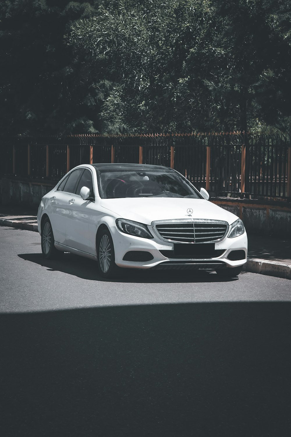 white mercedes benz coupe on road during night time