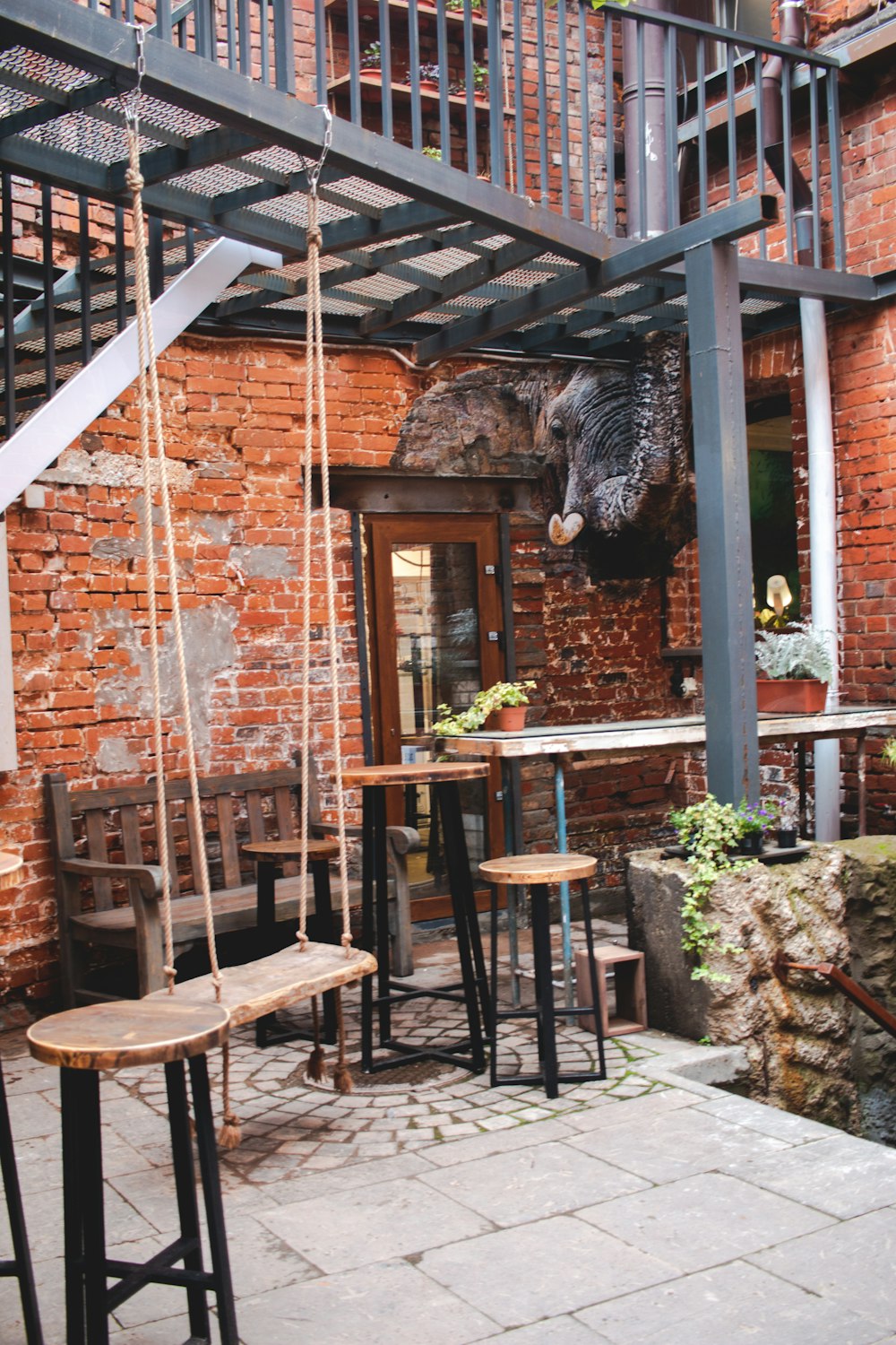 brown wooden table and chairs