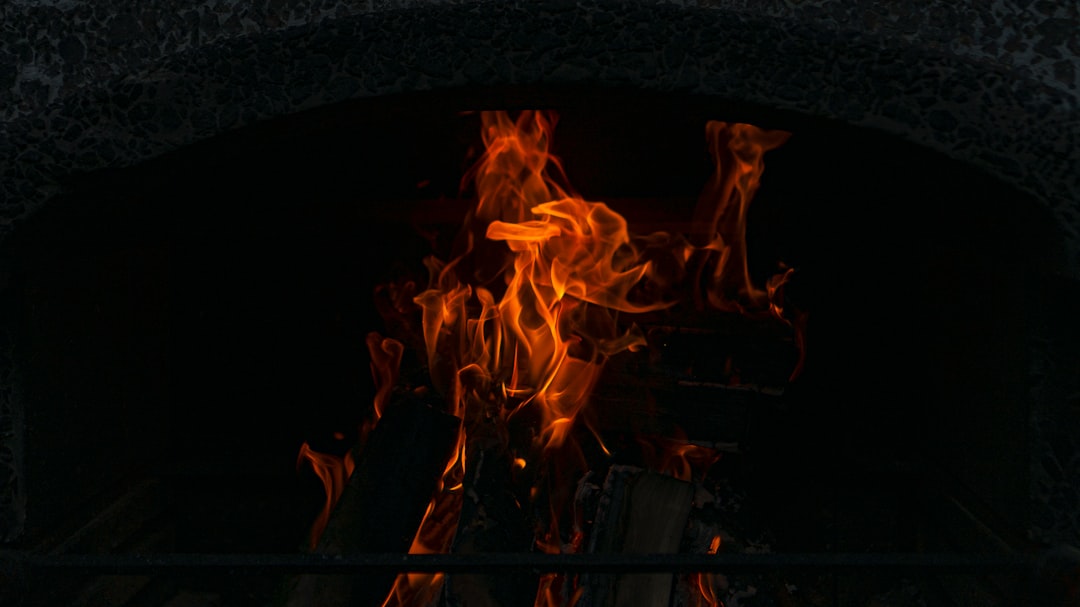 fire in black round fire pit