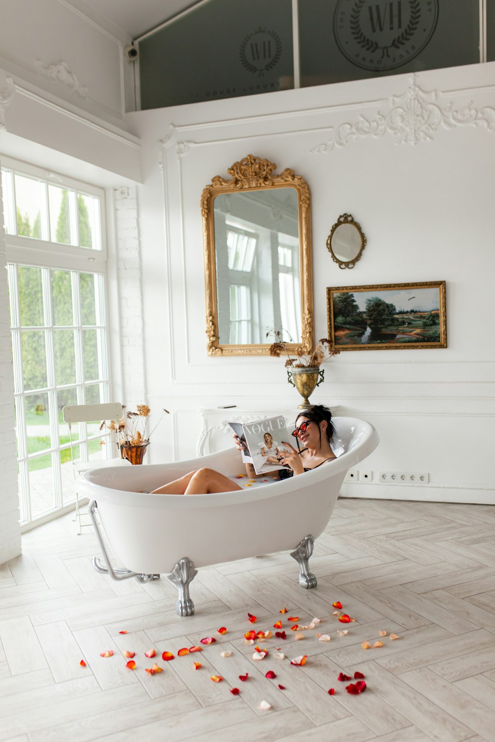 woman in bathtub with mirror