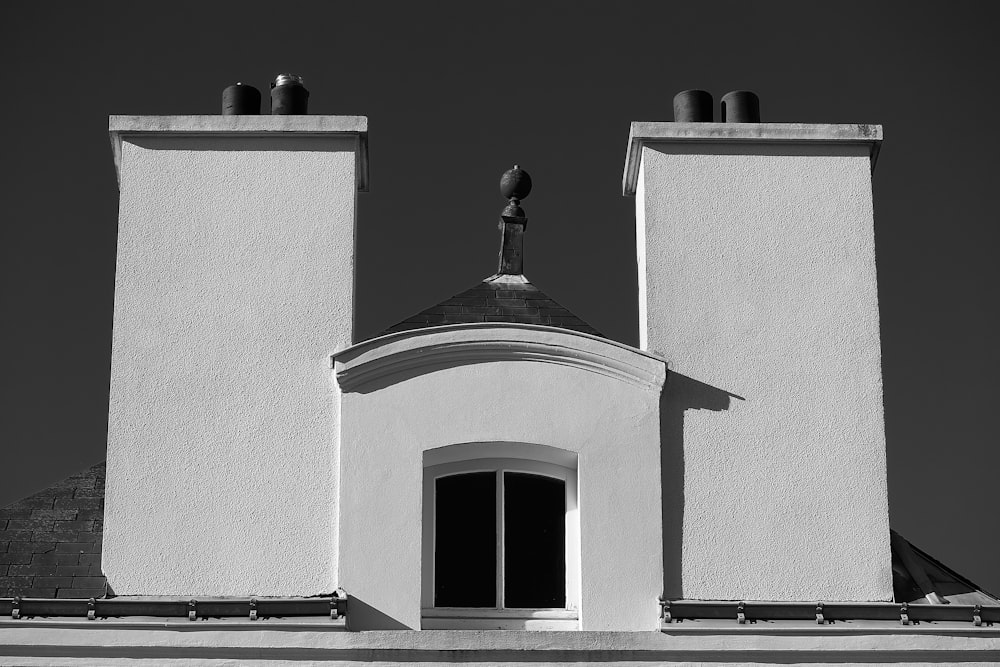 gray scale photo of concrete building