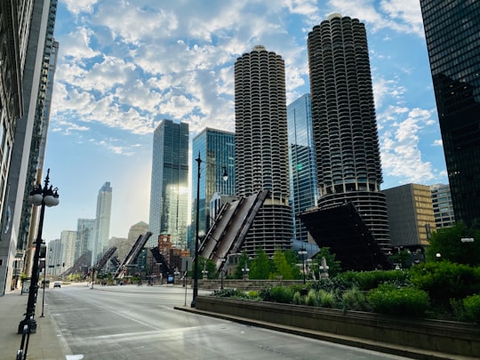 city buildings under blue sky during daytime in Chicago Riverwalk United States