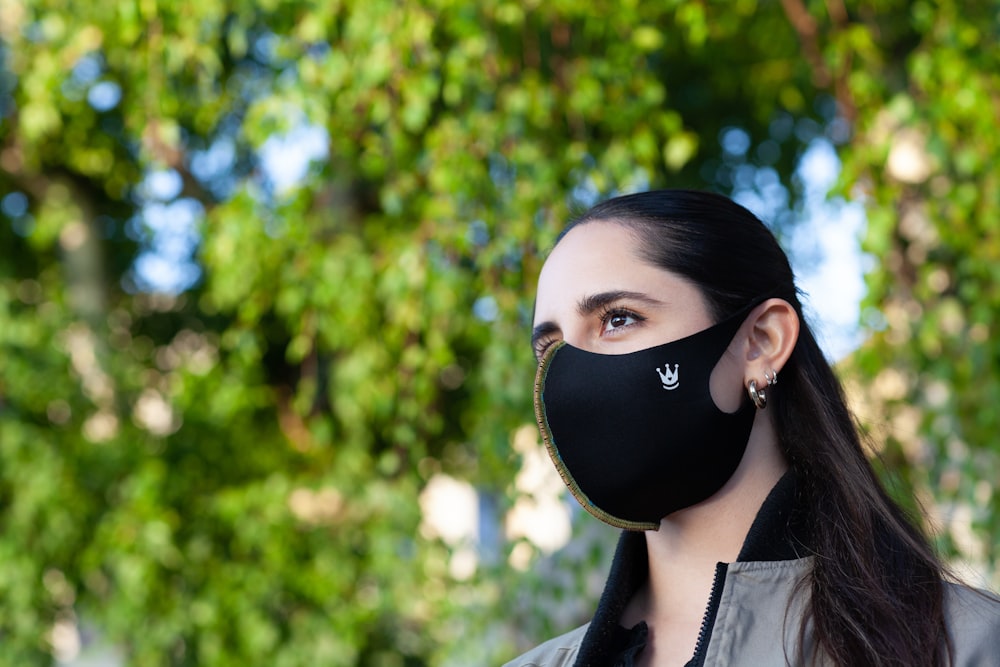 woman in black and white mask