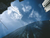 A detailed shot of construction cranes and modern buildings under development, reflecting growth and infrastructure.