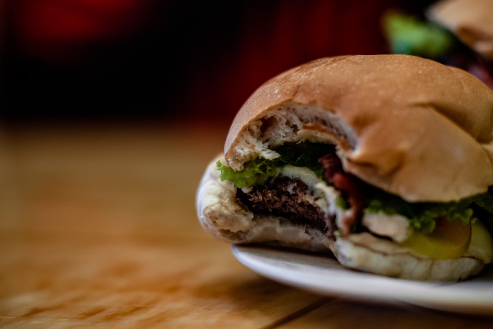 burger on white ceramic plate