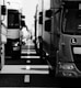 grayscale photo of cars on road