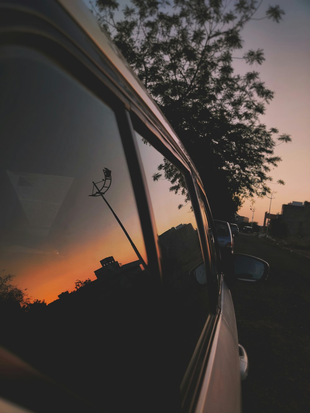 car on road during sunset