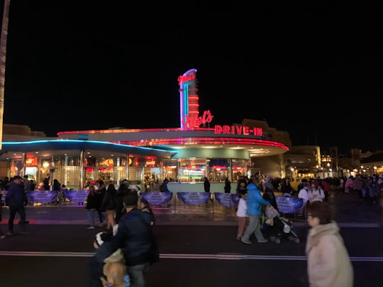 people walking on street during nighttime in Mel's Drive-In Japan