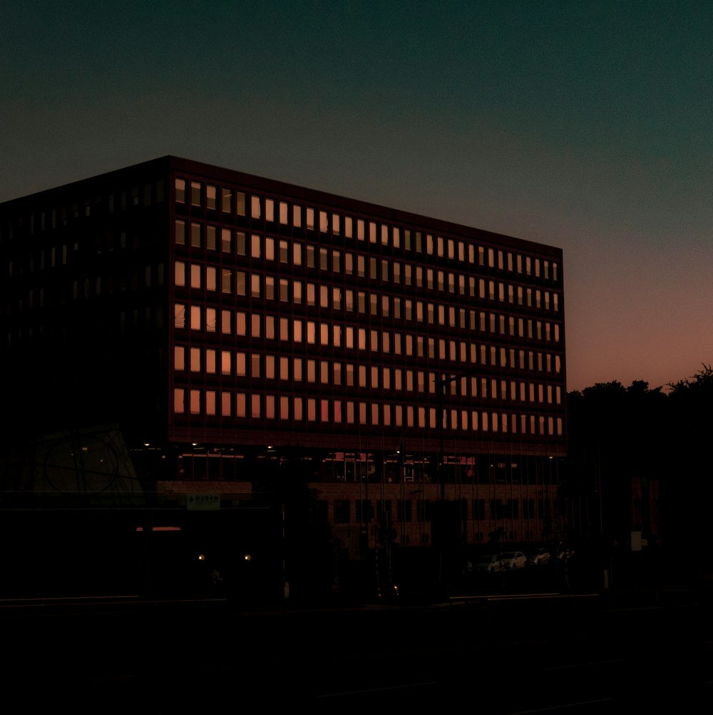 brown concrete building during night time