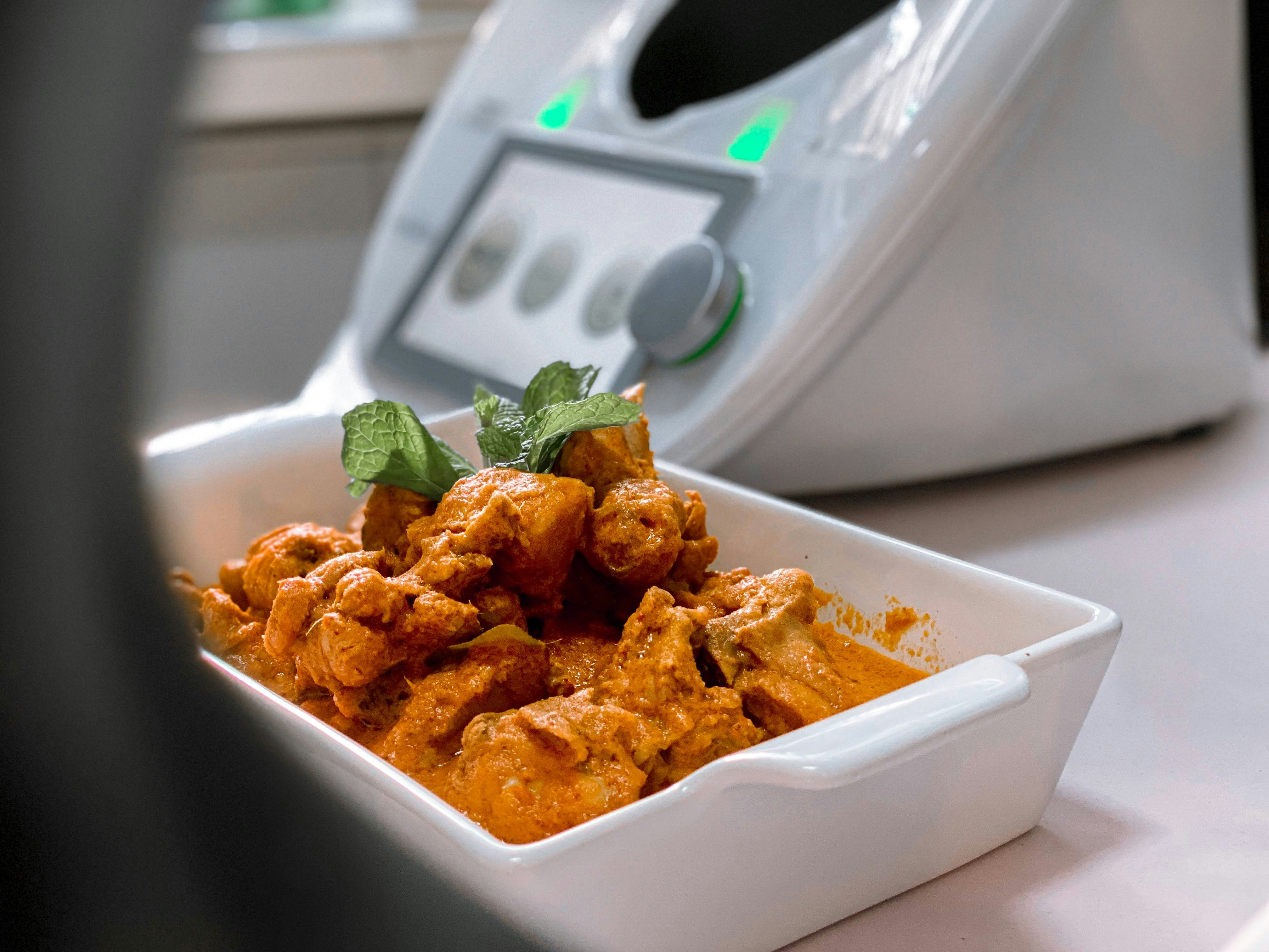 fried food on white ceramic bowl