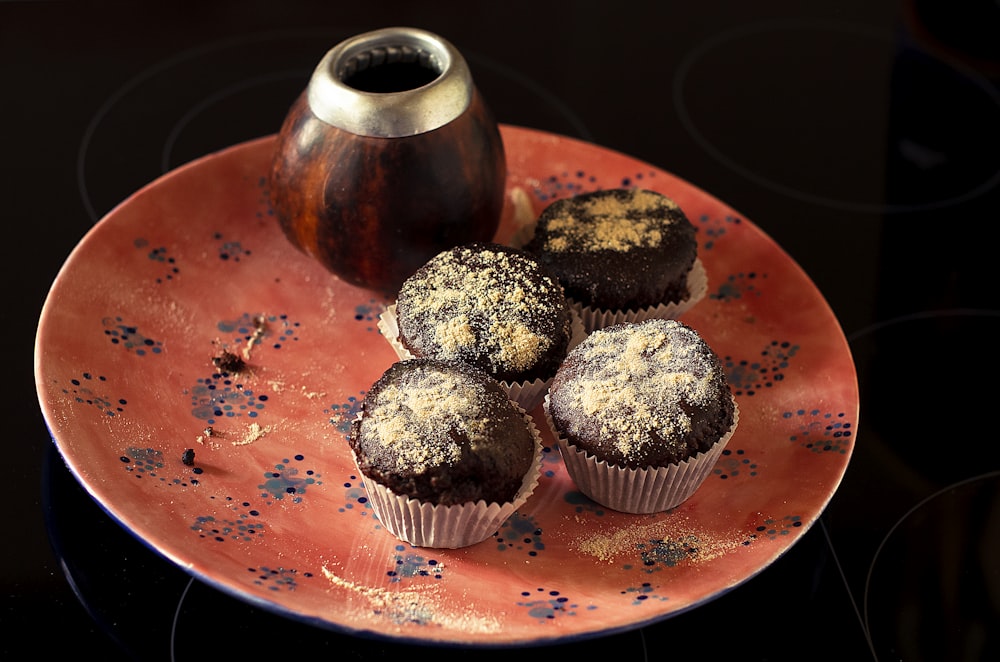 cupcakes on orange ceramic plate