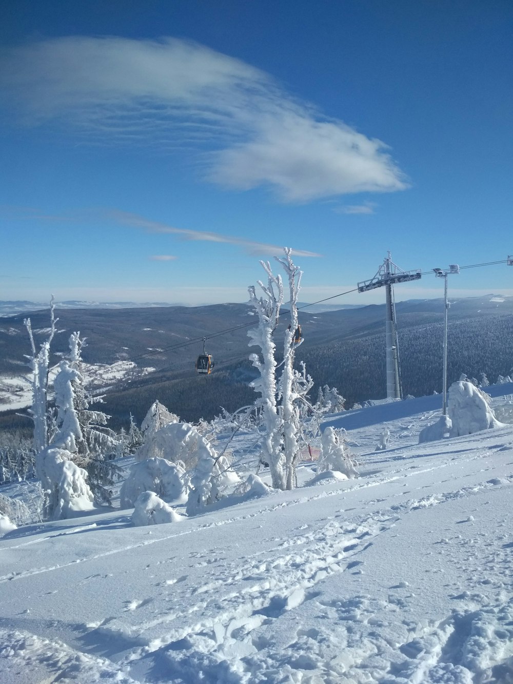 snow covered mountain under blue sky during daytime