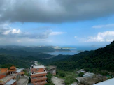 Scenic view of Okinawa coastline with students enjoying a cultural outing.