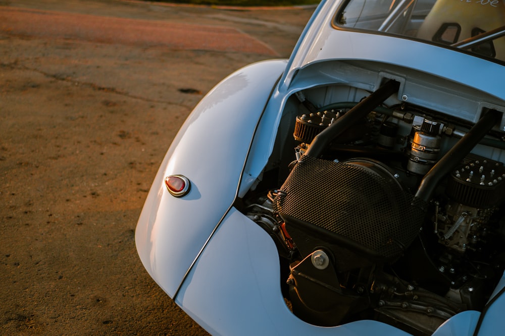 white car on brown soil