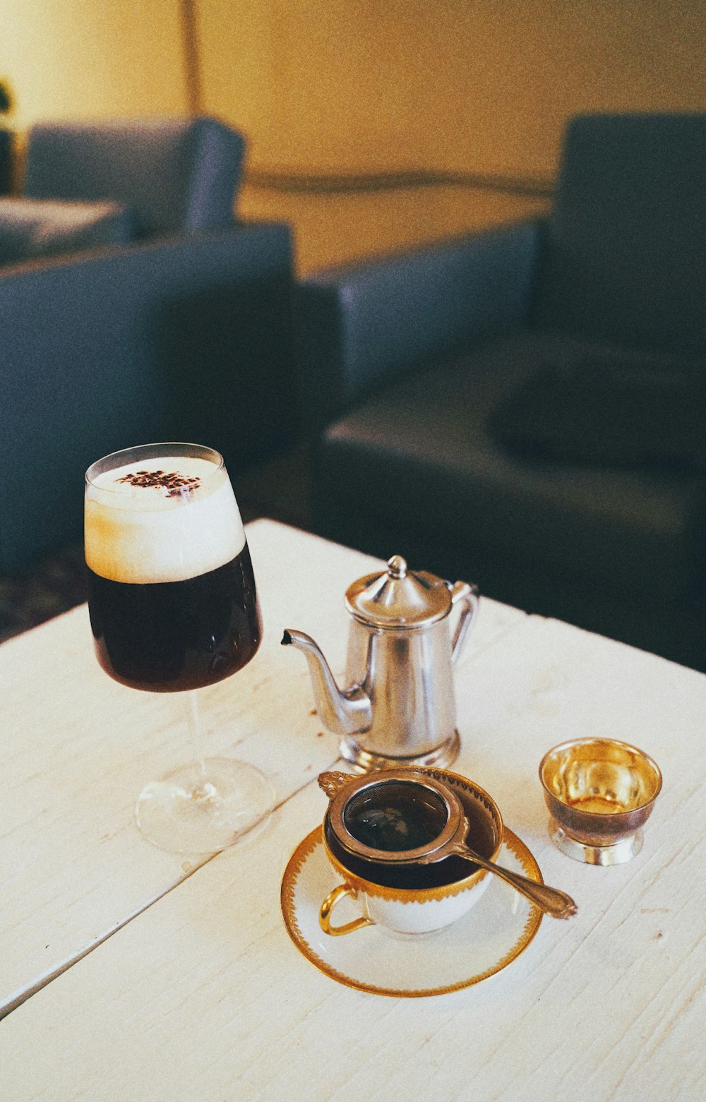 clear glass mug on brown wooden table