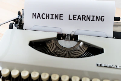 Instructor explaining machine learning concepts on a digital whiteboard in a modern classroom.