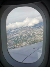 A scenic aerial view of Prayagraj highlighting Sarangapur, Jhunsi, Naini, and Jhalwa airport area.