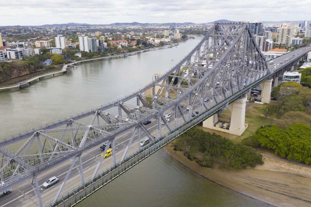 gray metal bridge over river during daytime