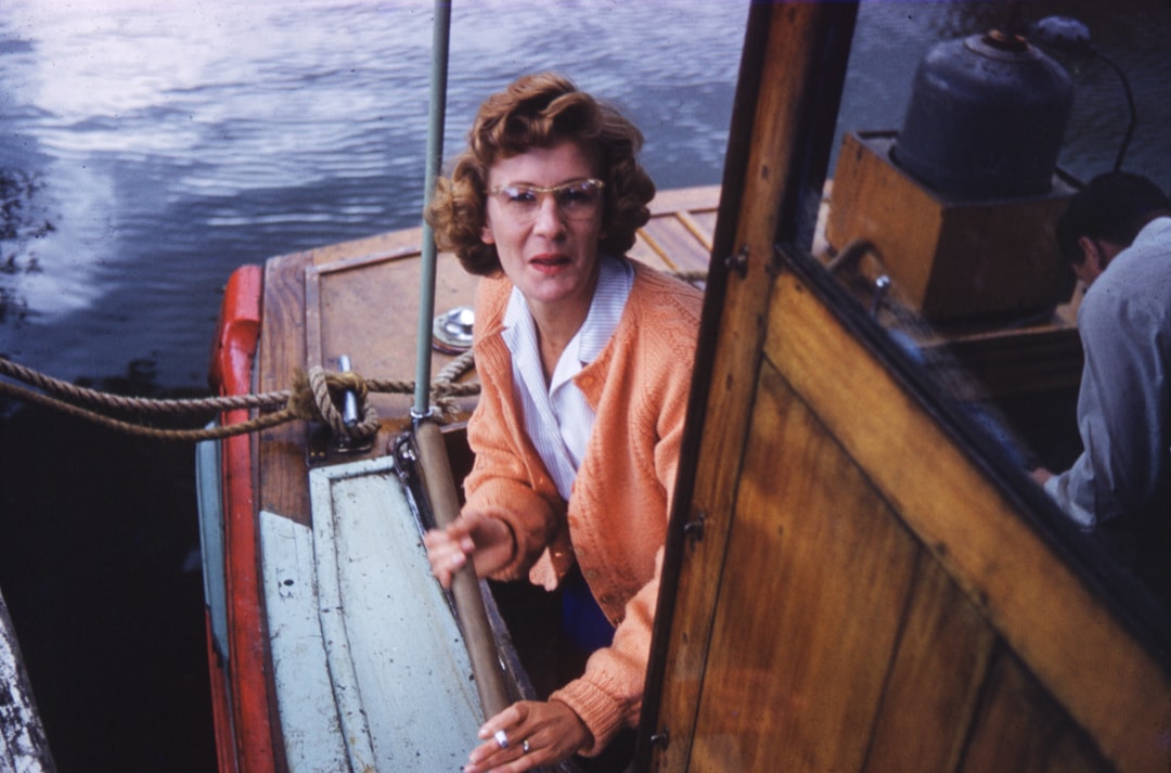 man and woman in boat during daytime