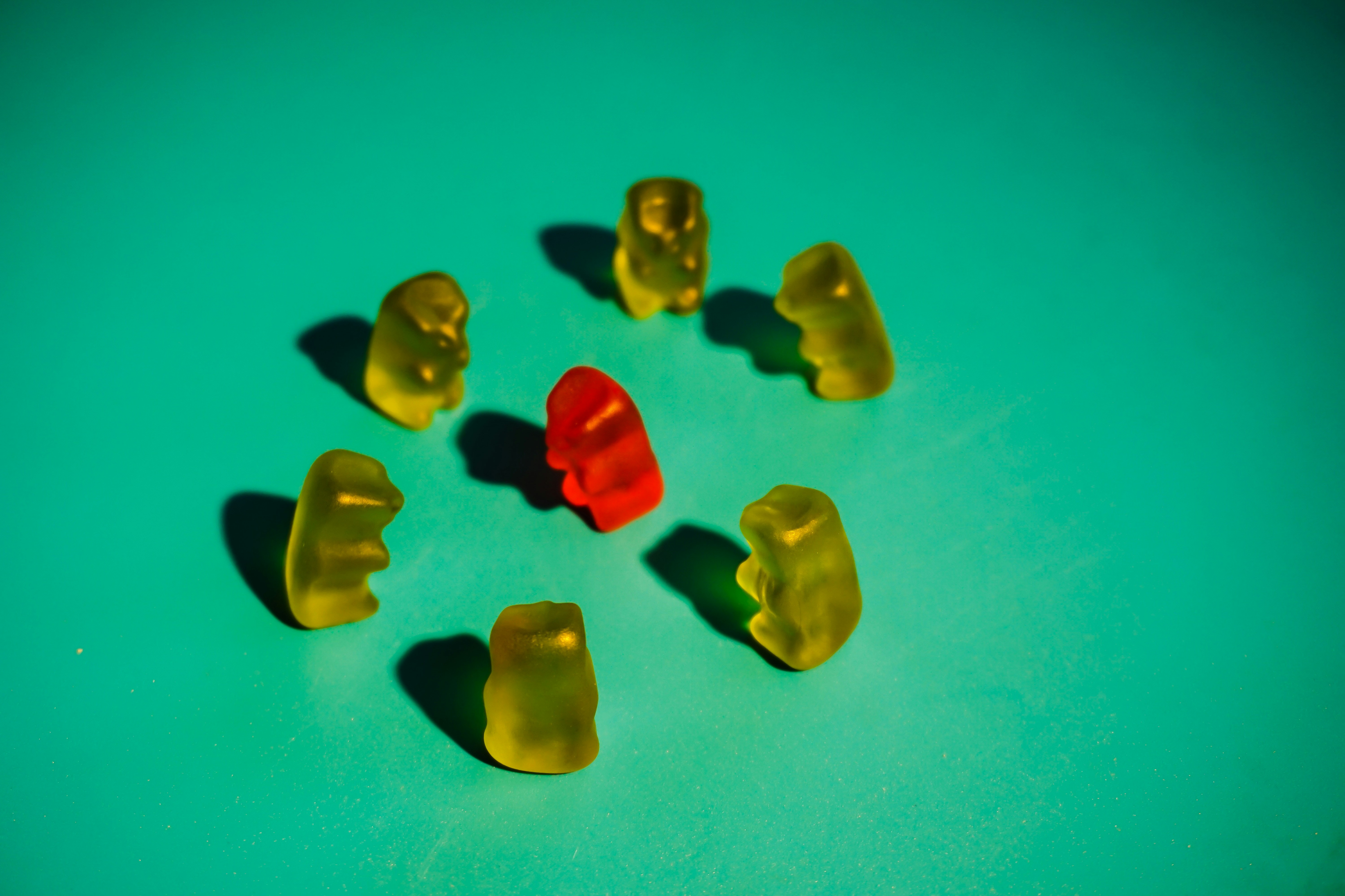 white and blue stones on blue surface confectionery teams background