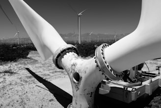 Technician performing maintenance on a wind turbine blade