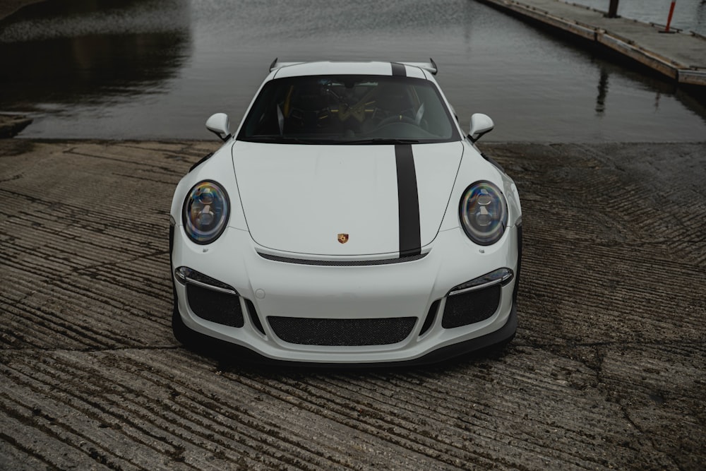 white porsche 911 on road