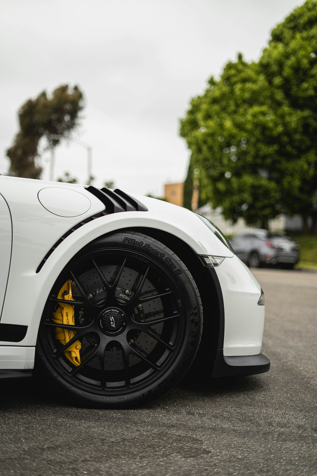 white car on road during daytime