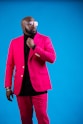 man in pink suit wearing sunglasses