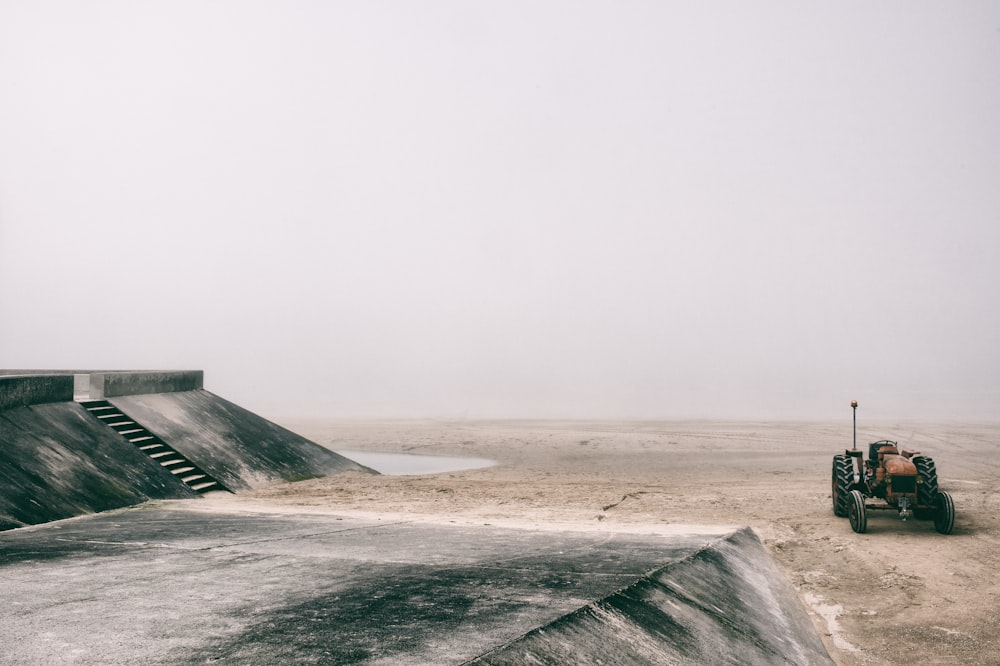 gray concrete building on gray sand