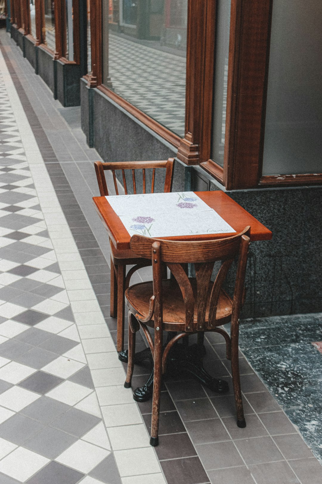 brown wooden chair beside table