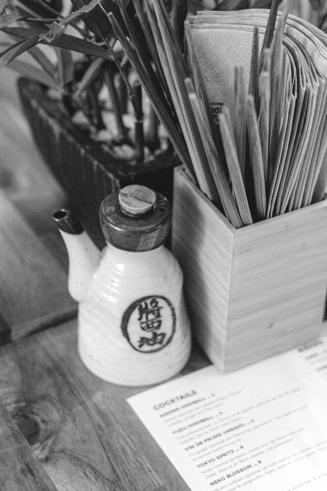 white ceramic teapot on white wooden table