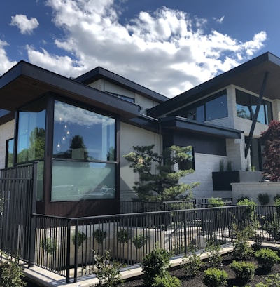 white and brown wooden house under blue sky during daytime