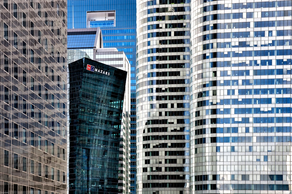 white and blue high rise building