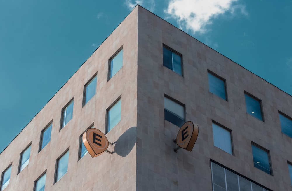 brown concrete building under blue sky during daytime