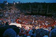 people on ice skating rink during night time