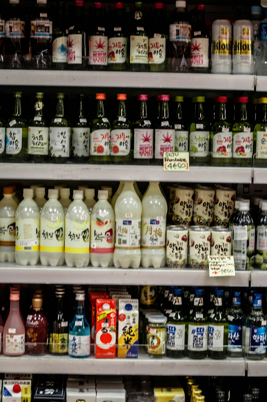 white labeled bottles on shelf