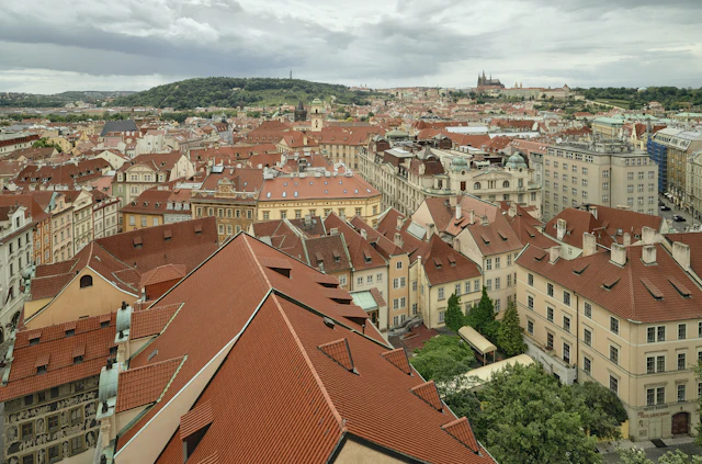 Red and white rooftops of an old hillside village seen from above