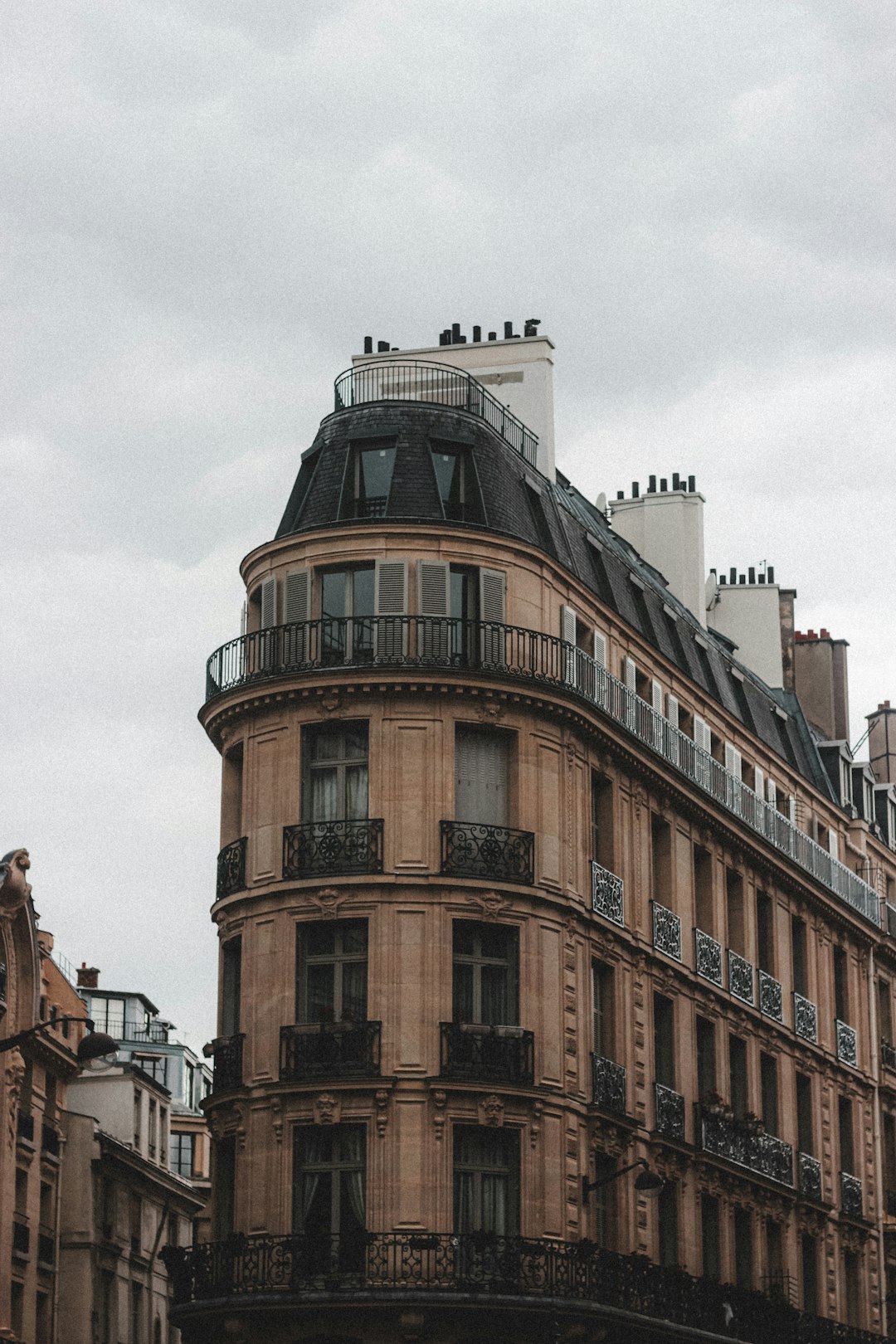 brown concrete building under white sky during daytime