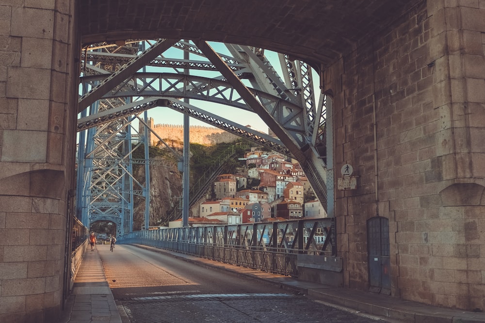 people walking on bridge during daytime