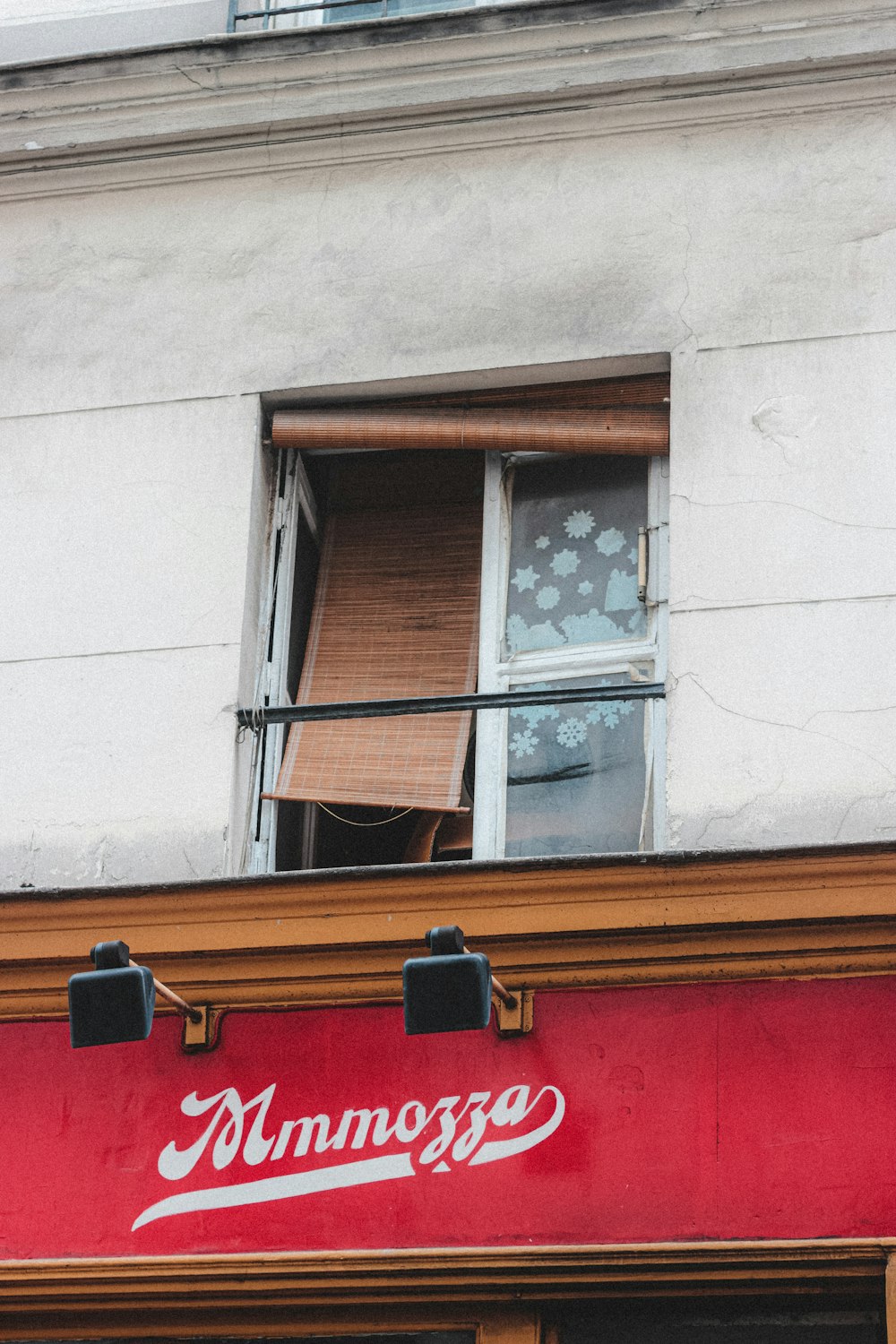 brown wooden framed glass window