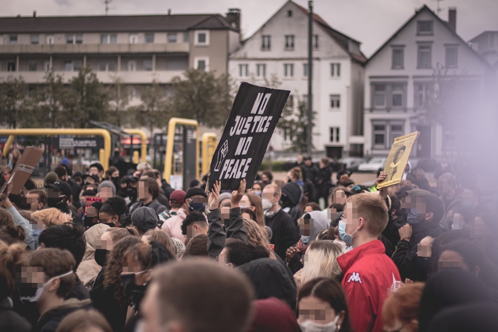 people gathering on street during daytime