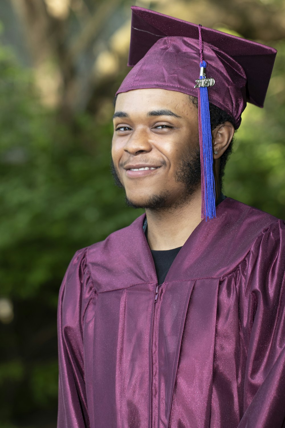 man in blue academic dress