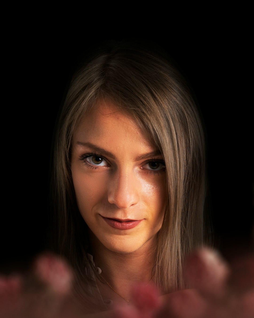 woman with brown hair smiling